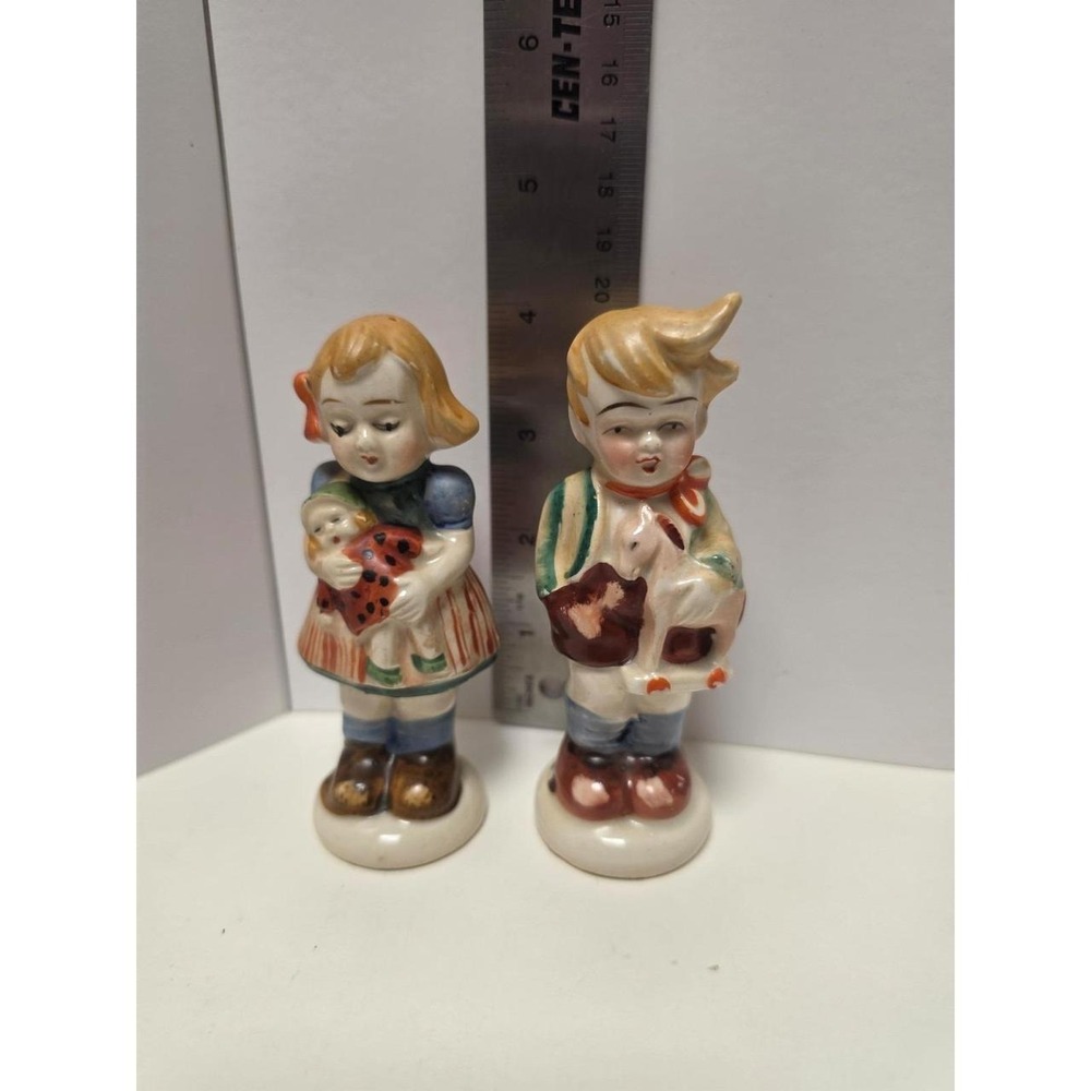 vintage ceramic salt and pepper shakers Occupied Japan boy holding a lamb girl